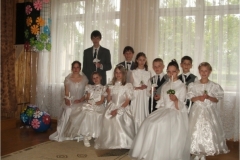 Pirmoji komunija. Grįžus iš bažnyčios. 2006 metai